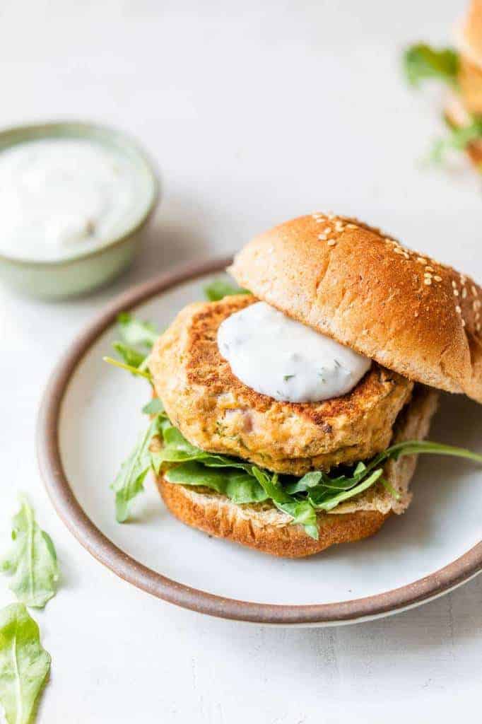 salmon burgers made with canned salmon on a small white plate