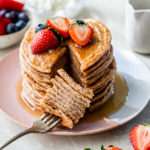 fluffy stack of cottage cheese pancakes with fresh fruit