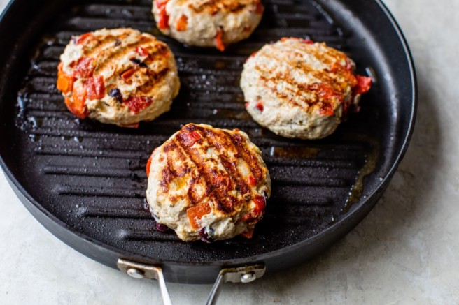 Turkey burgers on a grill pan.