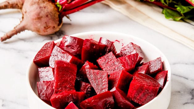 steamed beets in a white bowl