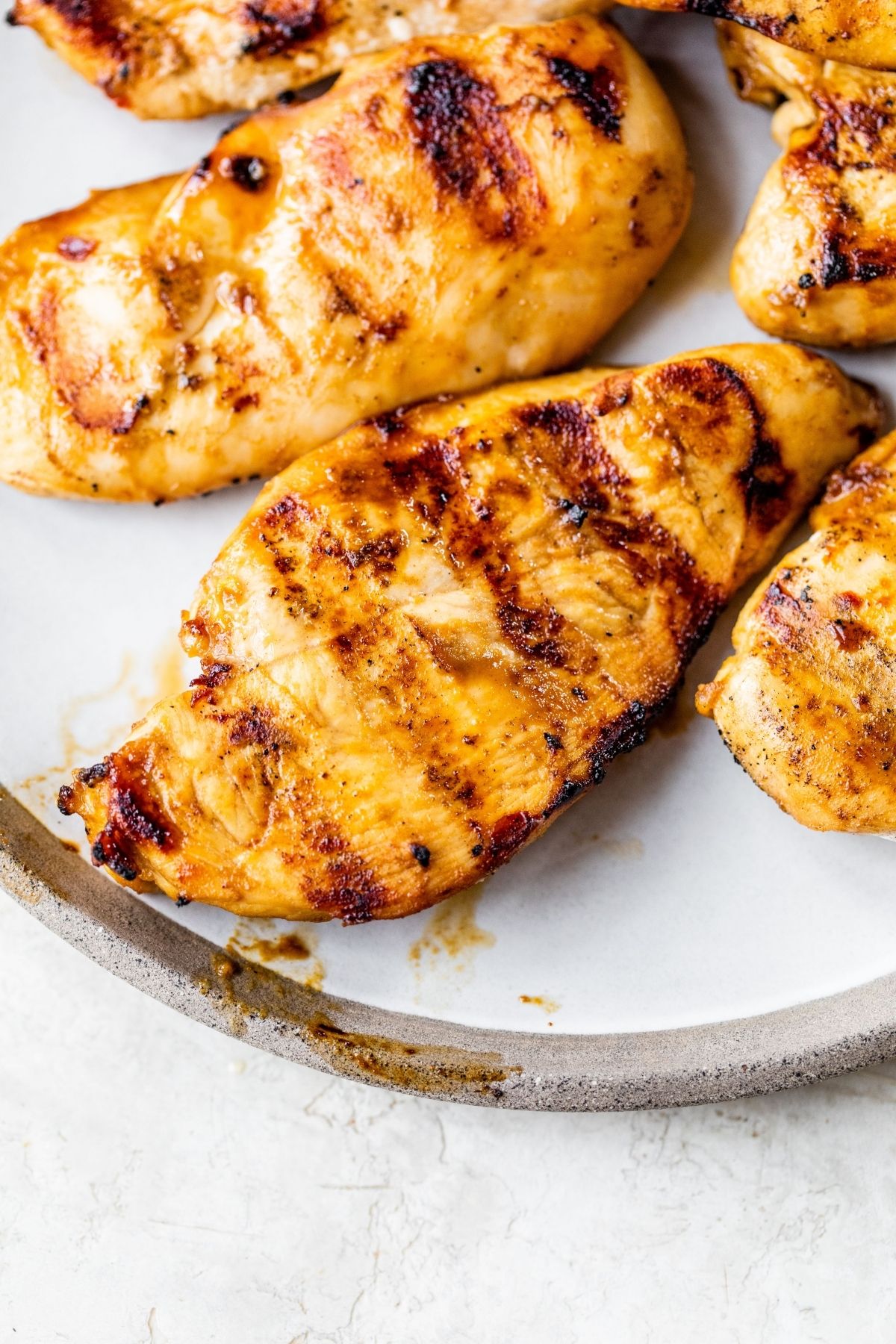 Grilled Asian Chicken on a white serving platter.
