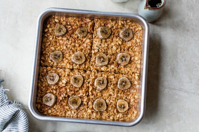 Baked oatmeal in a pan cut into servings.