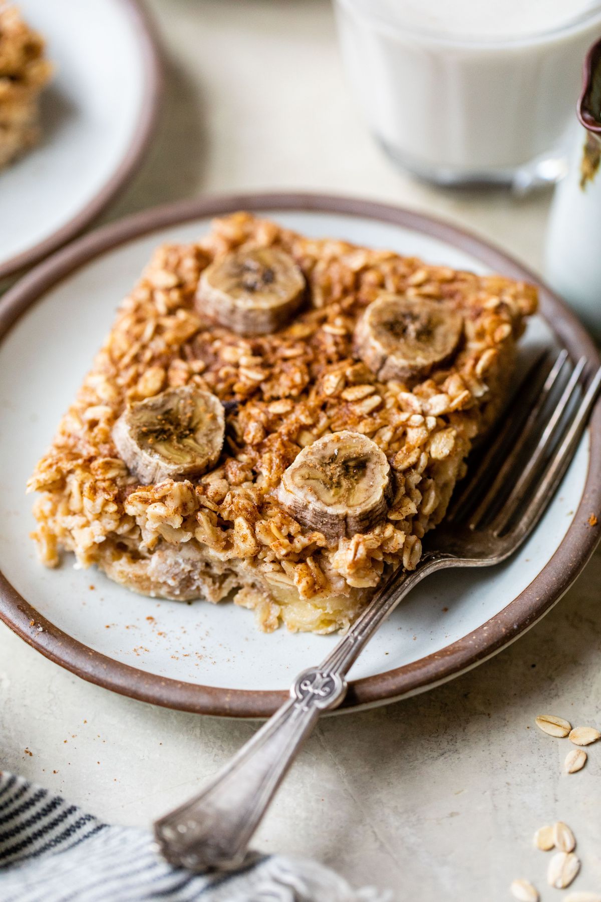 Serving of baked banana oatmeal on a plate. 