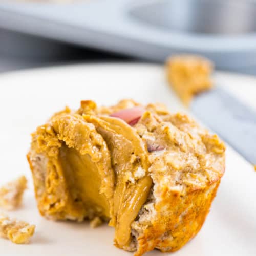 apple muffin with a schemer of almond butter spread