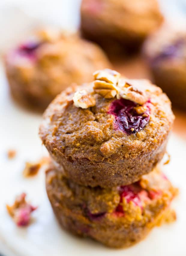 two Pumpkin Cranberry Muffins stacked 