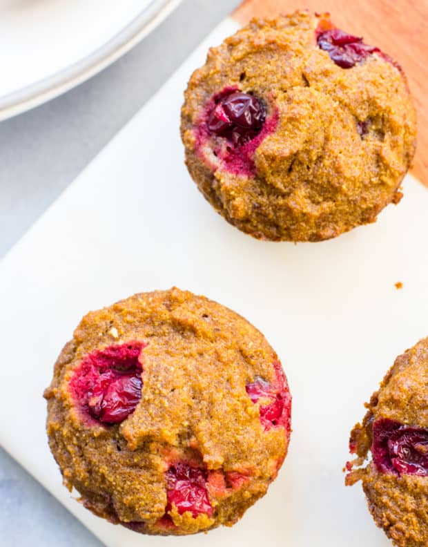 Pumpkin Cranberry Muffins served on a white plate 
