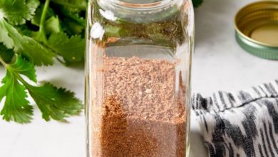 homemade taco seasoning in a small measuring spoon