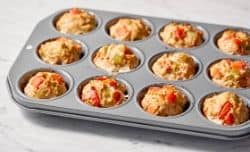 cooked mini meatloaves in muffin pan