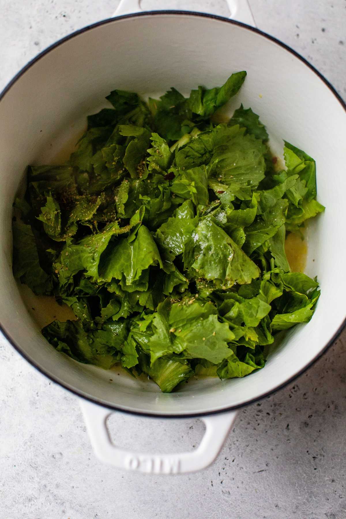 Escarole cooking in a large pot.