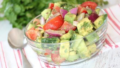 simple avocado and tomato salad with red onions and fresh herbs