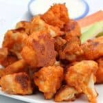 buffalo cauliflower oven baked with crunchy carrots and celery