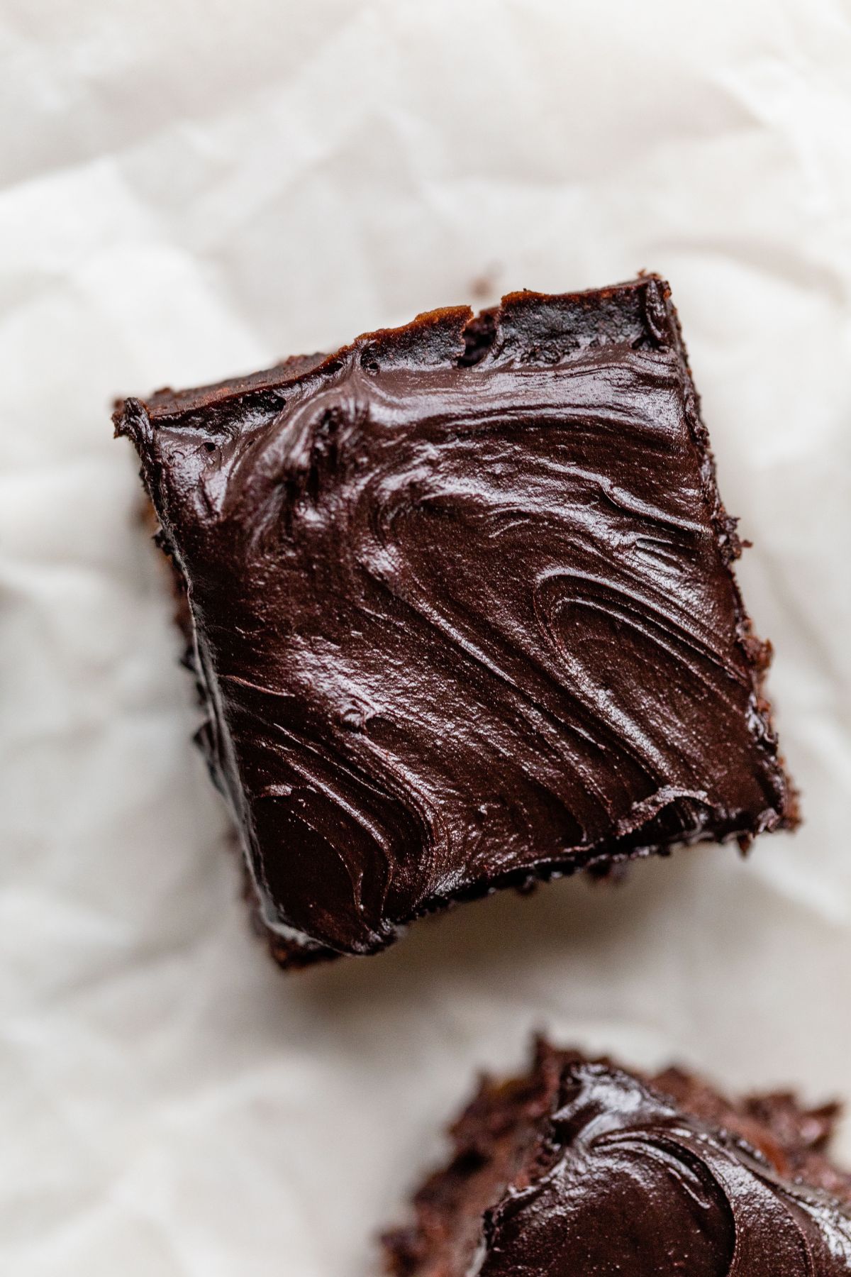 Black bean brownie topped with icing.