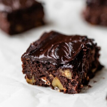 Black bean brownies topped with icing.