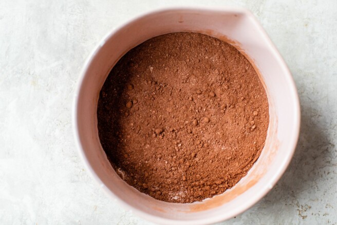 Cocoa powder mixed with flour in a large bowl.