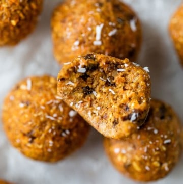 carrot cake energy balls on parchment paper