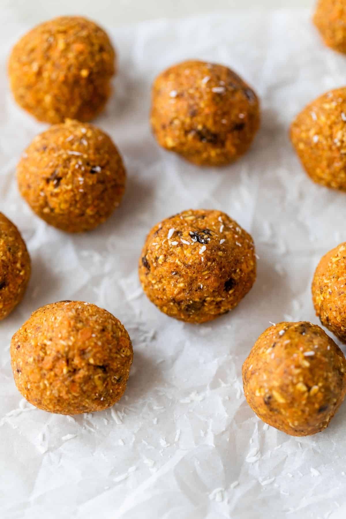 carrot cake energy bites on parchment paper