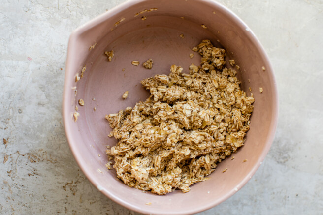 banana and oats mashed in a bowl together