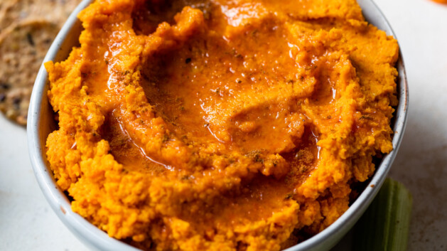 roasted carrot hummus topped with homey and cinnamon
