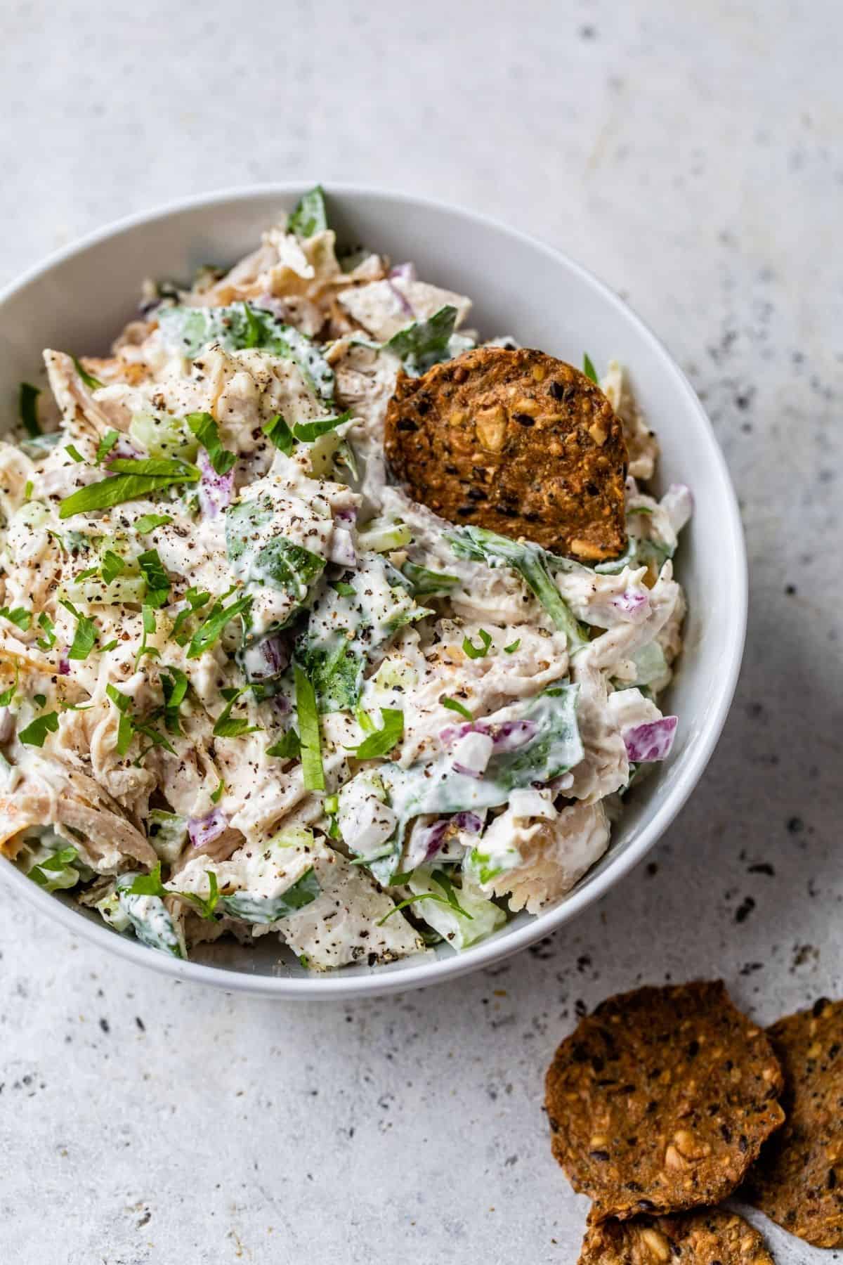 rotisserie chicken salad with a cracker 