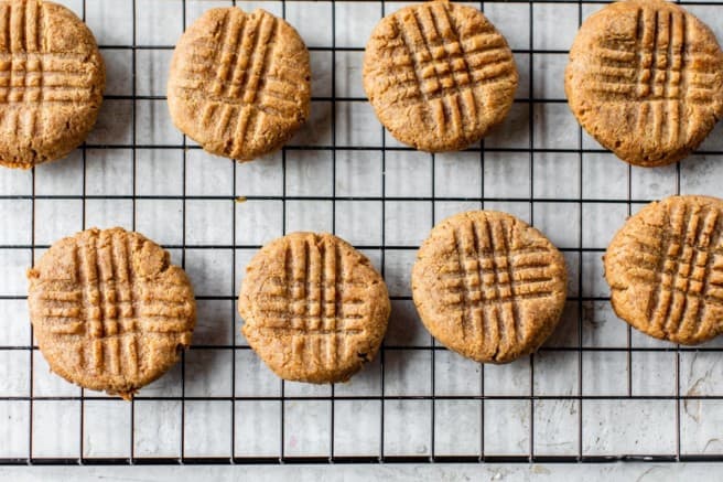 peanut butter cookies cooling on a wire rack