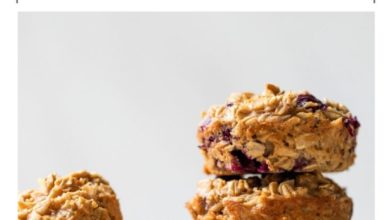 blueberry oatmeal muffin cups stacked on top of each other
