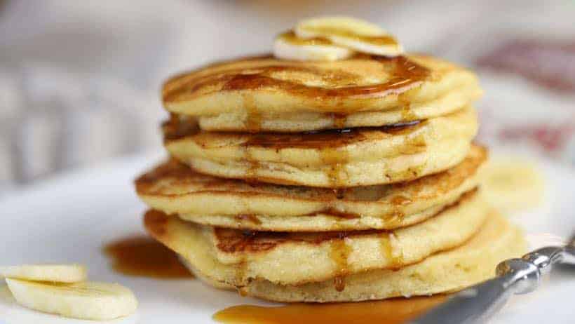 Almond flour pancakes with bananas and maple syrup
