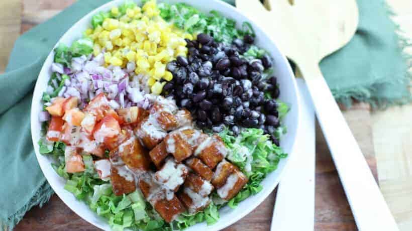 chopped romaine topped with corn, black beans, red onion, tomatoes, and bbq tofu drizzled with ranch dressing.