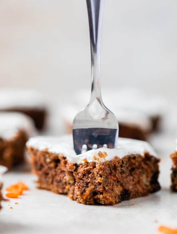 piece of carrot cake with a fork in the top