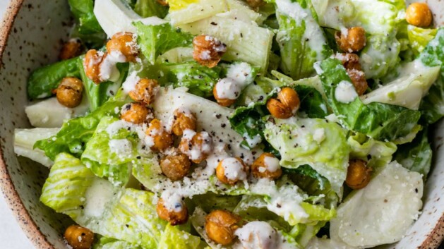 Healthy Caesar salad topped with roasted chickpeas.