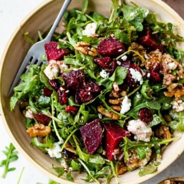 Beets tossed with arugula, walnuts and goat cheese.