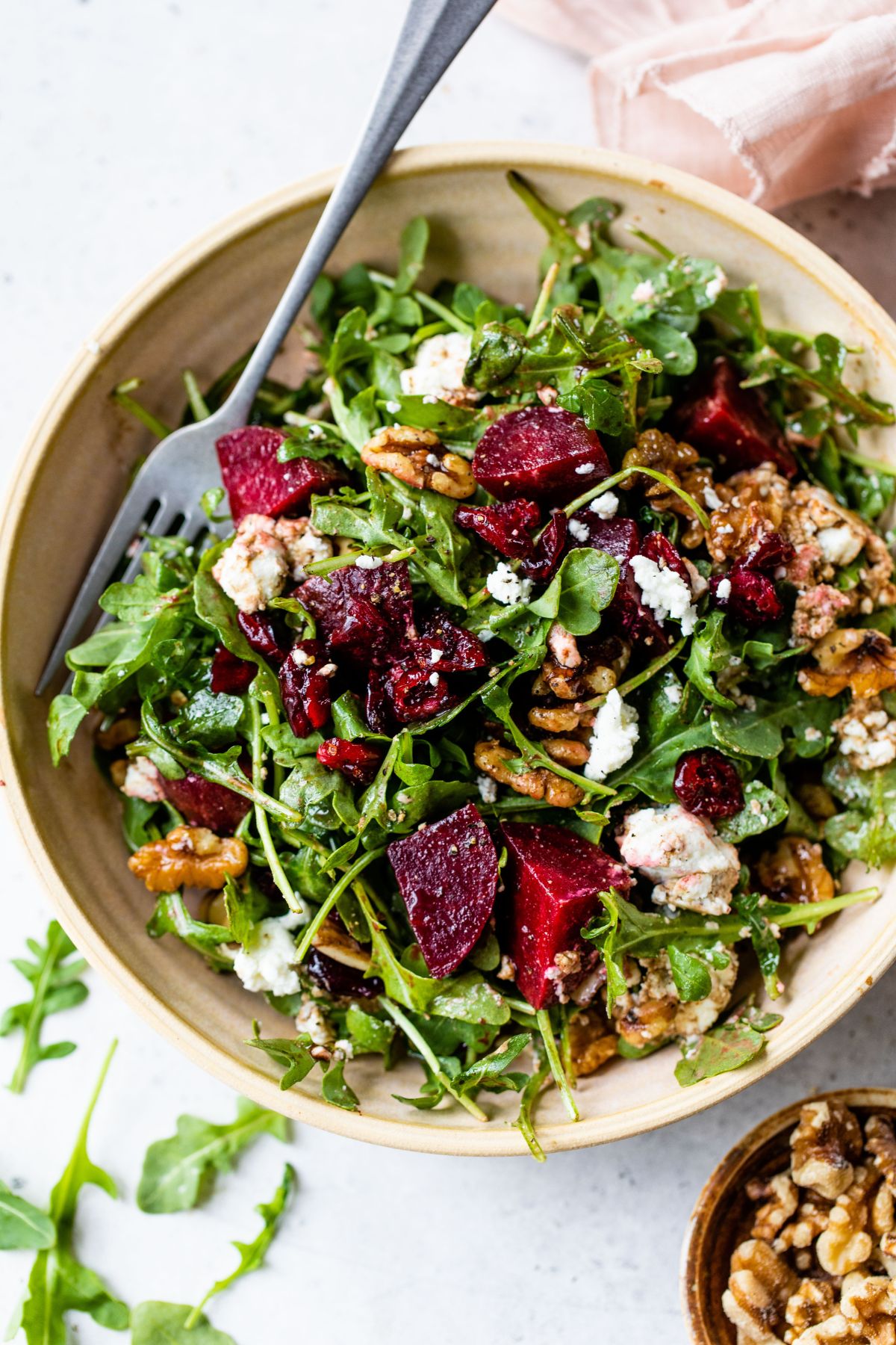 Beets tossed with arugula, walnuts and goat cheese.