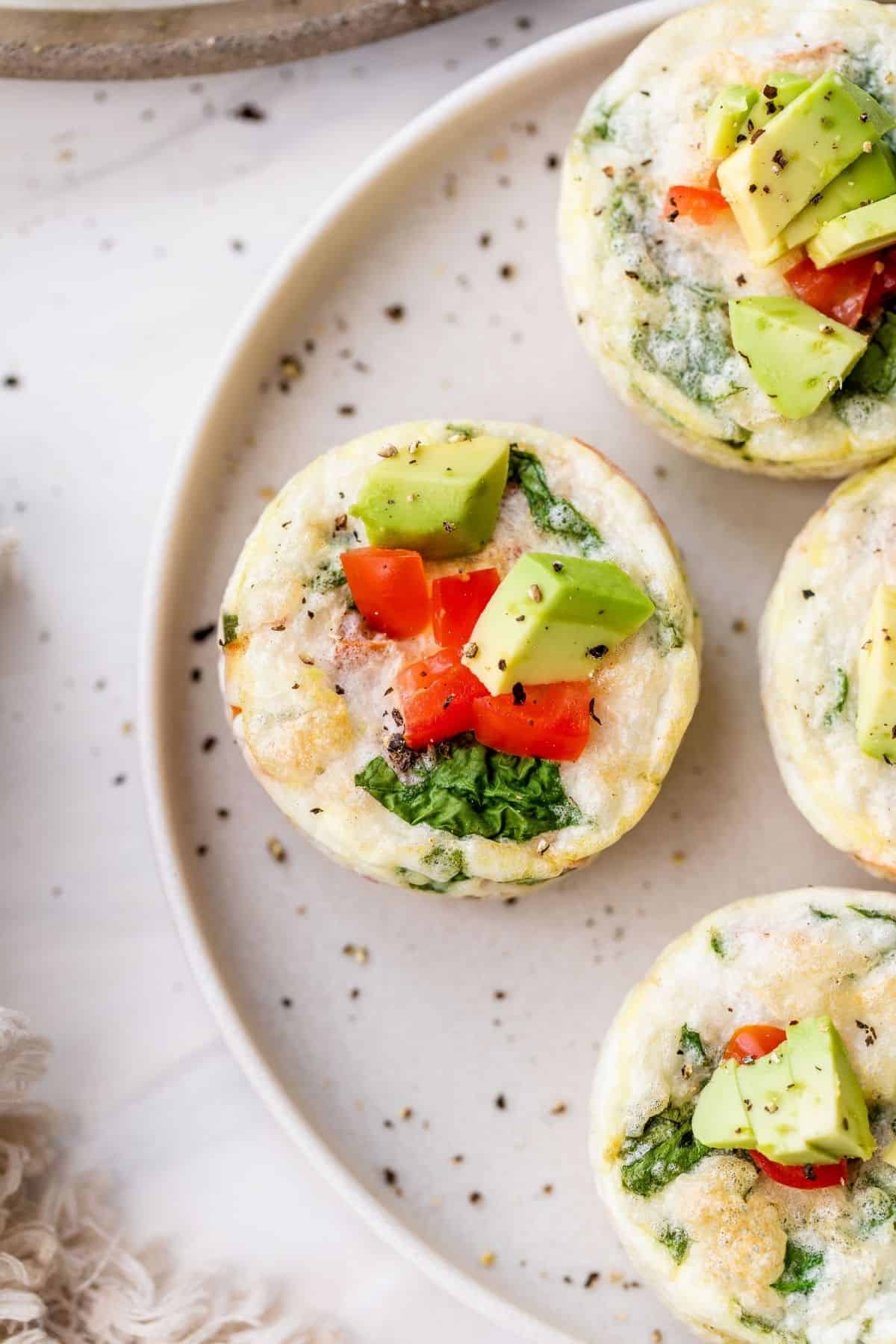 egg white muffins topped with diced avocado