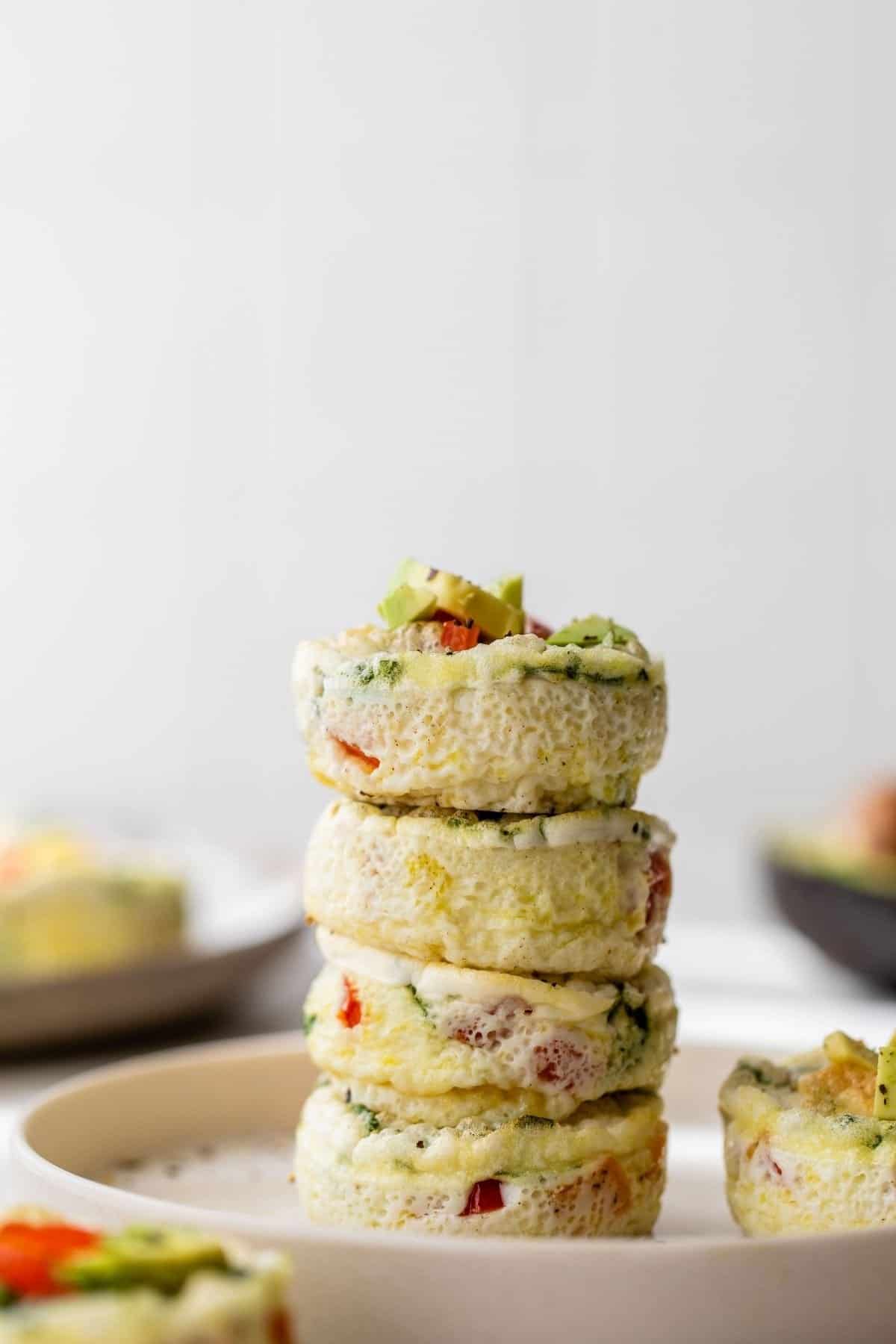 egg white muffins stacked on a plate
