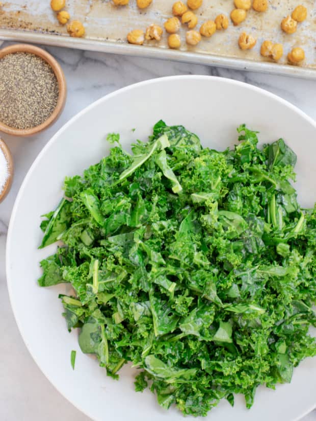 kale salad in a white bowl