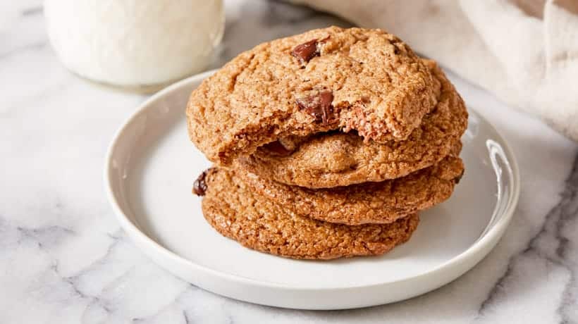 oat pulp cookies stacked on white plate