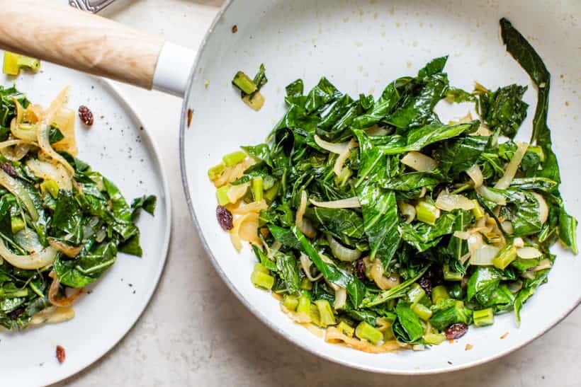 collard greens sauteed with raisins and onions