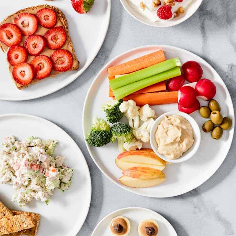 healthy meals and snacks on plates