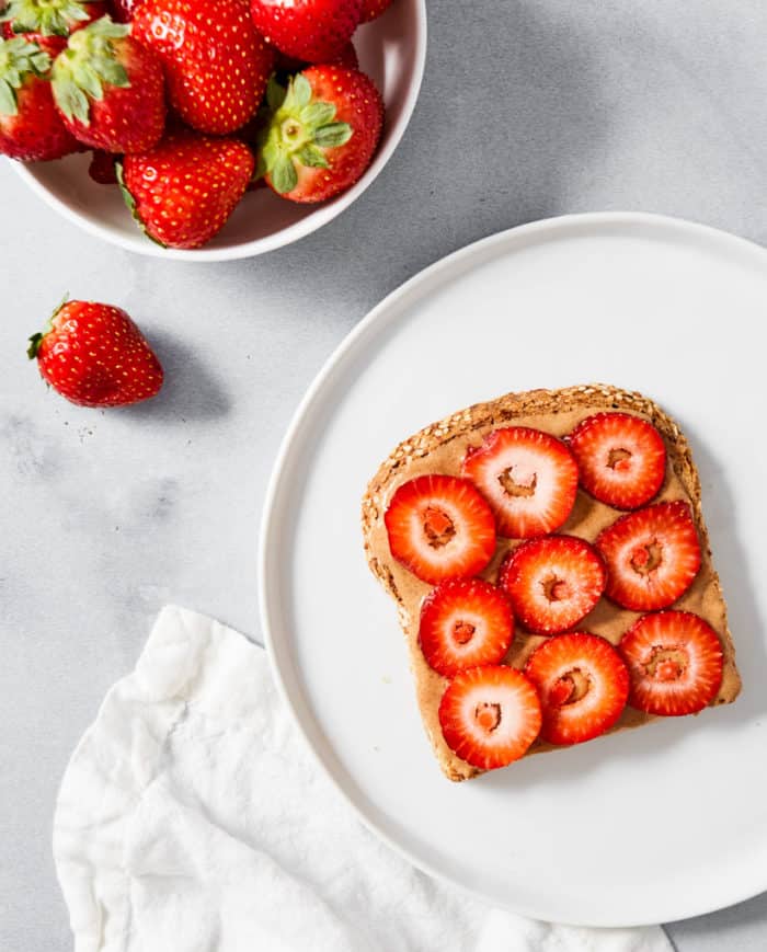 toast with nut butter and berries