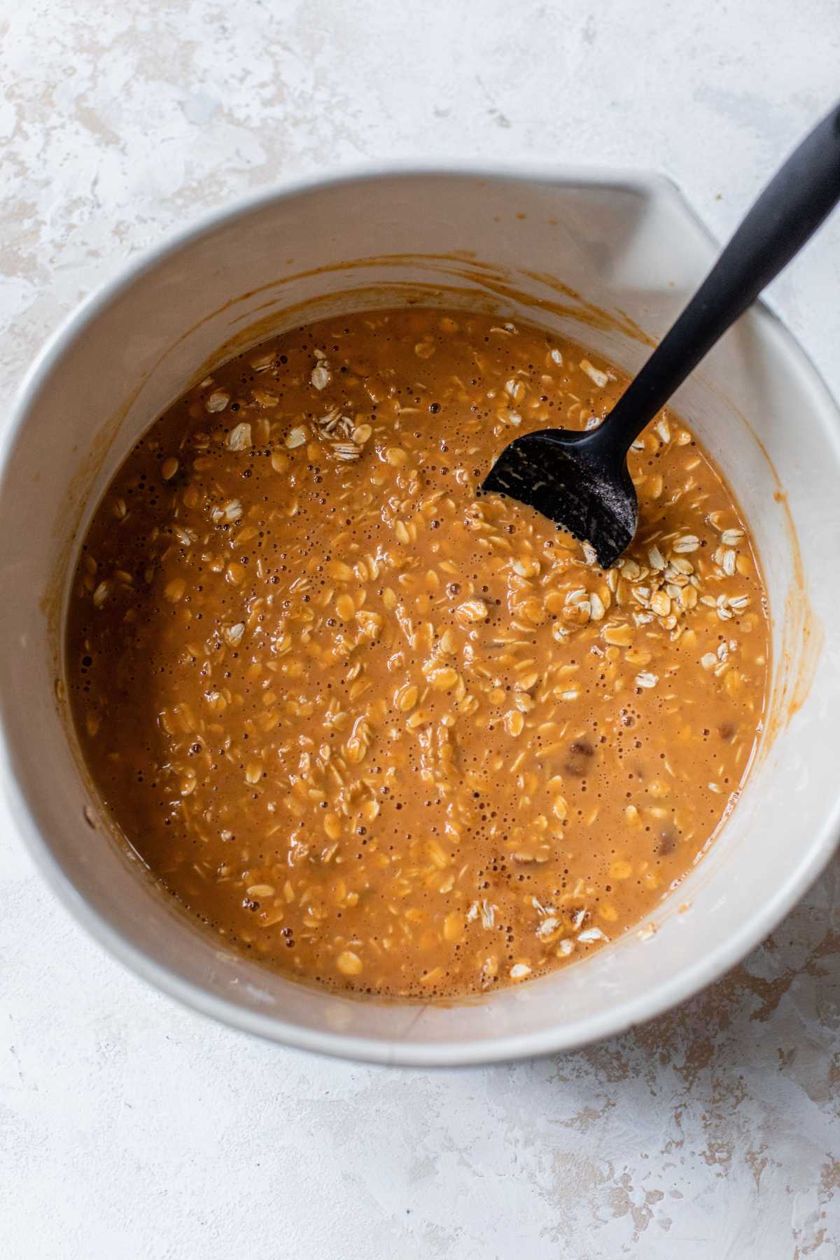 Stir oat mixture with pumpkin mixture.