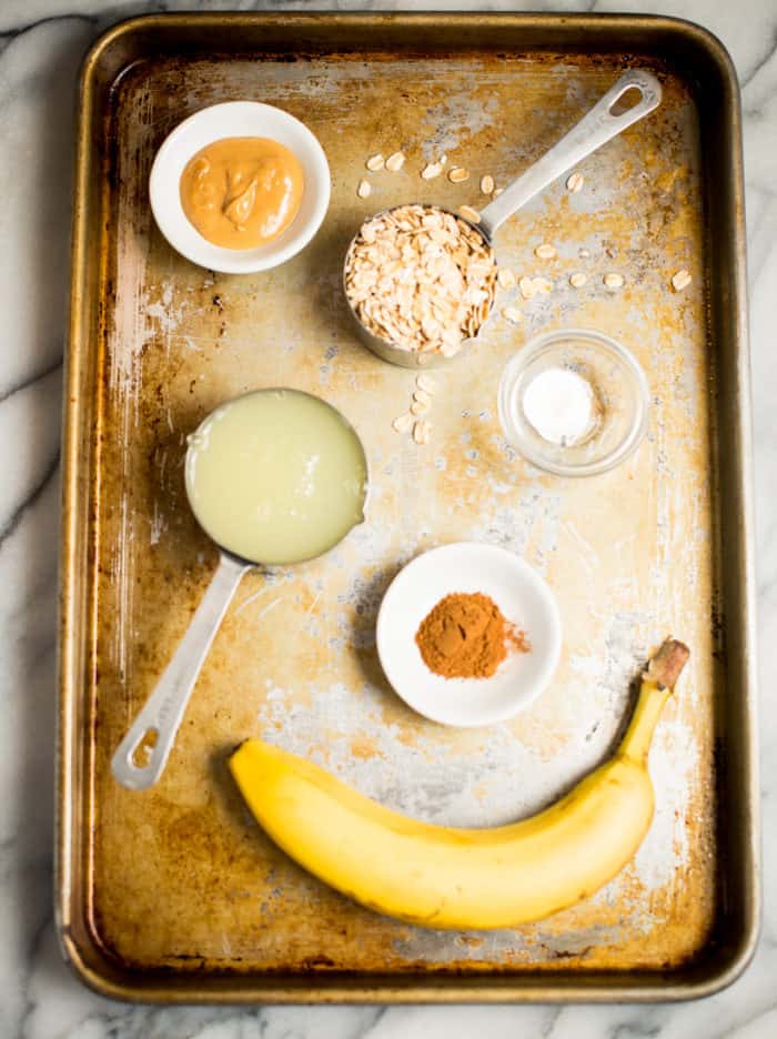 ingredients for peanut butter protein pancakes on a baking sheet 