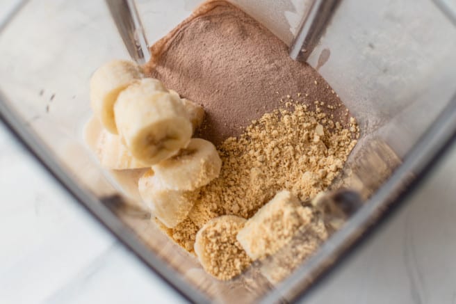 banana, pbfit, almond milk and chocolate protein powder in a blender