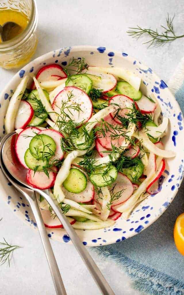 radish cucumber salad topped with fresh dill