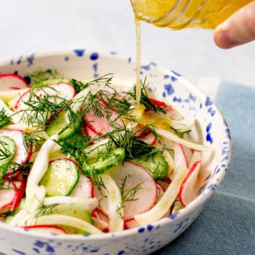 radish salad topped with fresh dill