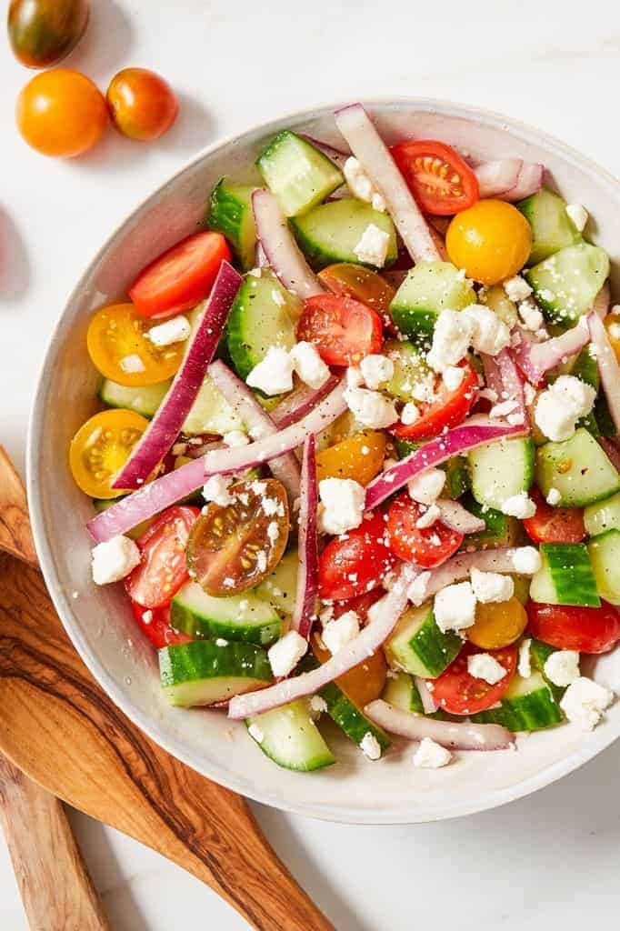 salad made with cucumber, tomato, red onion and feta cheese