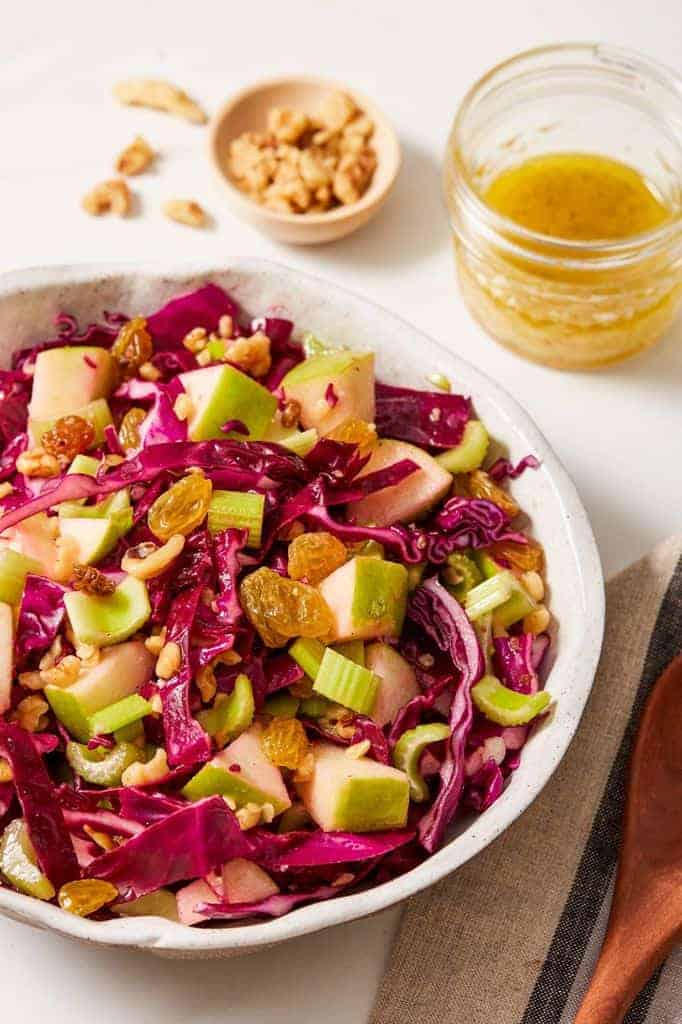 red cabbage salad with apple served with lemon vinaigrette 