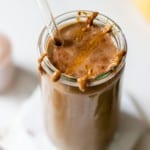 chocolate protein shake topped with almond butter