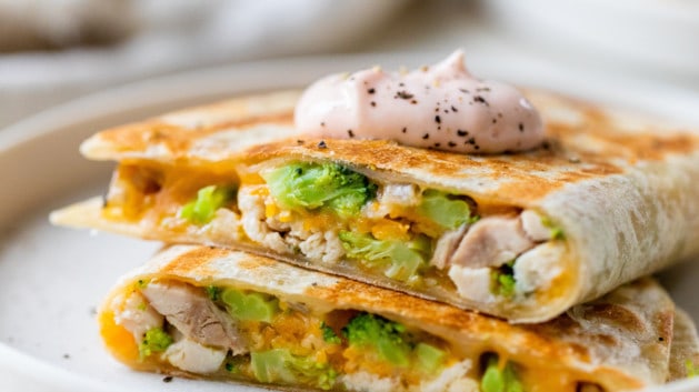 quesadillas topped with creamy dipping sauce
