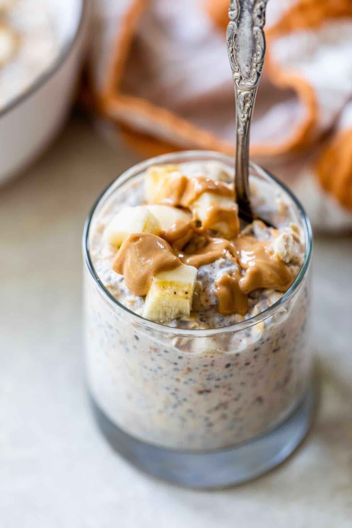 peanut butter banana overnight oats mixed in a glass jar