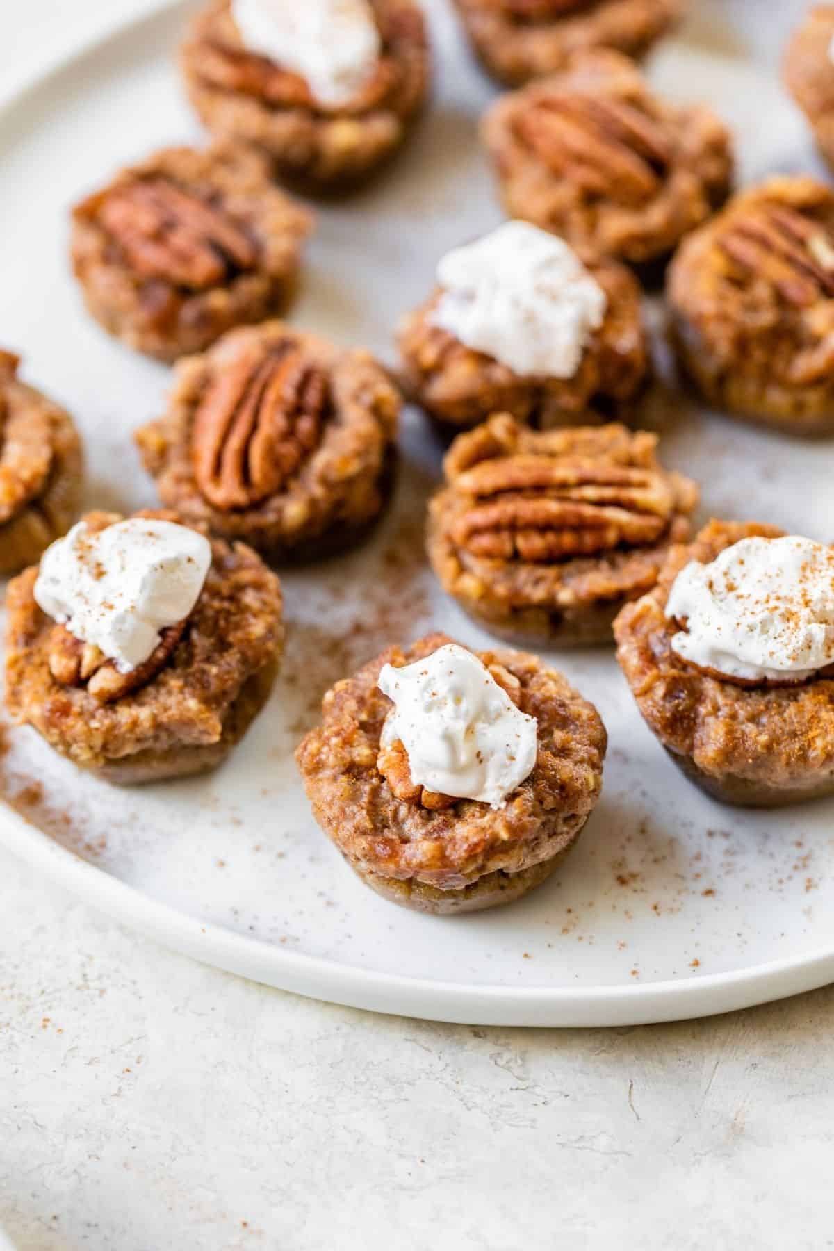 mini pecan pies on a serving plate