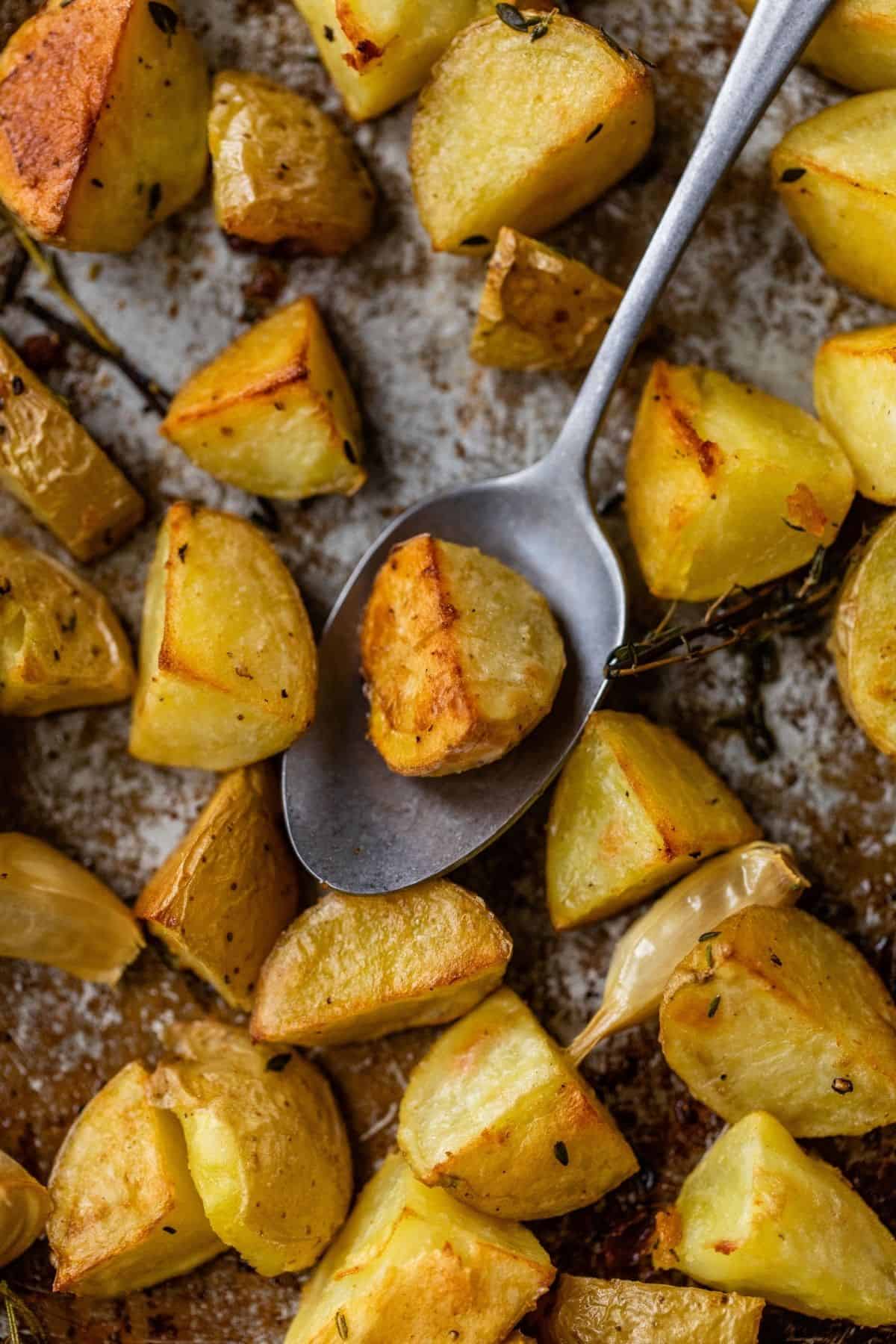 roasting potatoes on a sheet pan